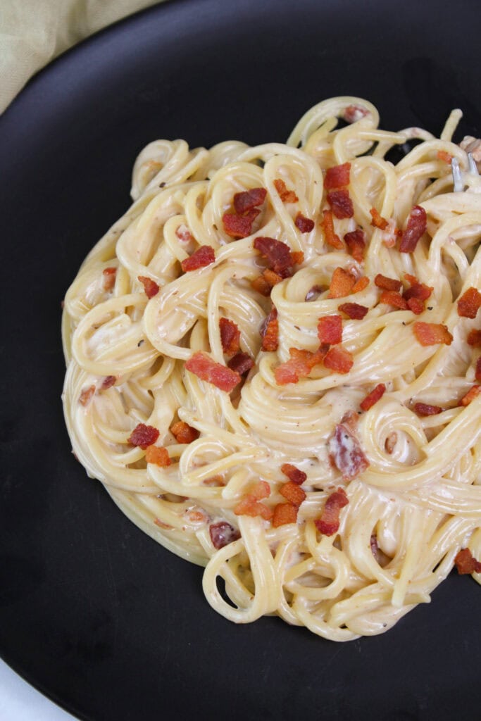 Spaghetti carbonara with bacon and parmesan.