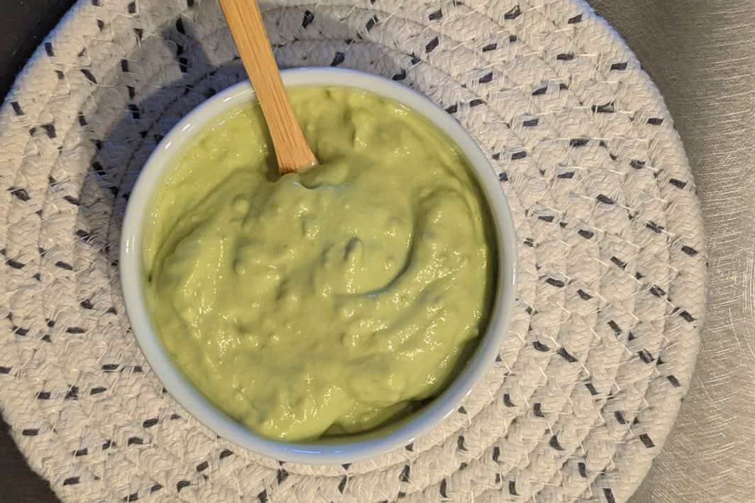 A bowl of freshly made avocado lime crema