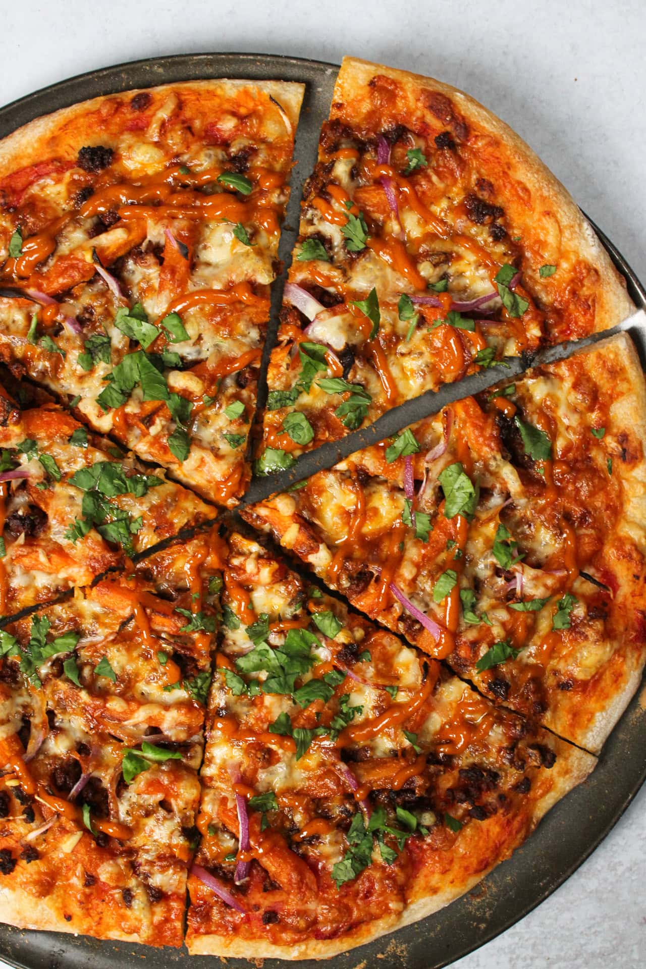 A chorizo sweet potato fry pizza.