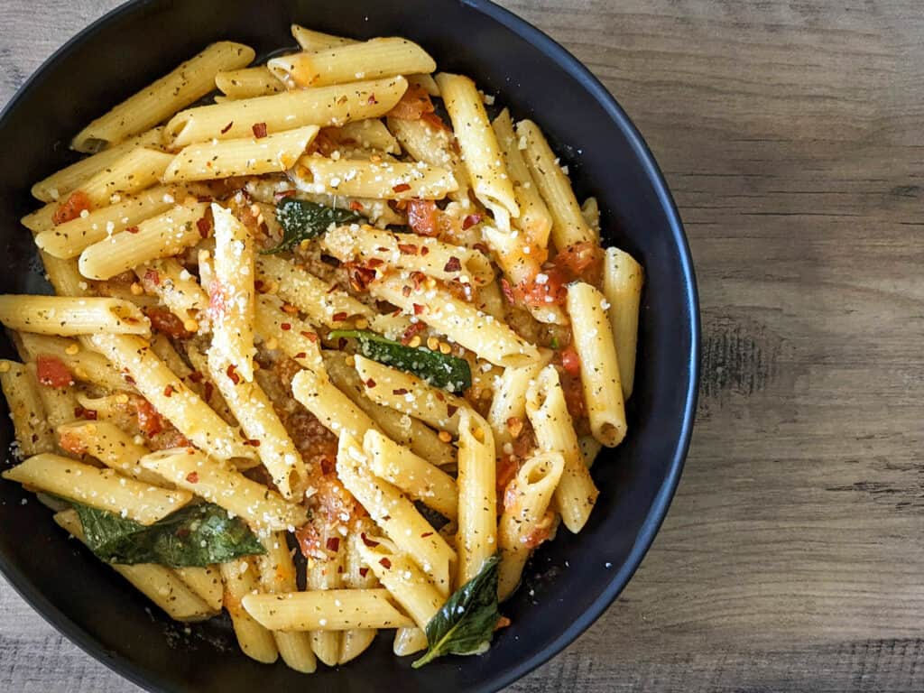 Vegetarian tuscan pasta with fresh tomatoes and basil