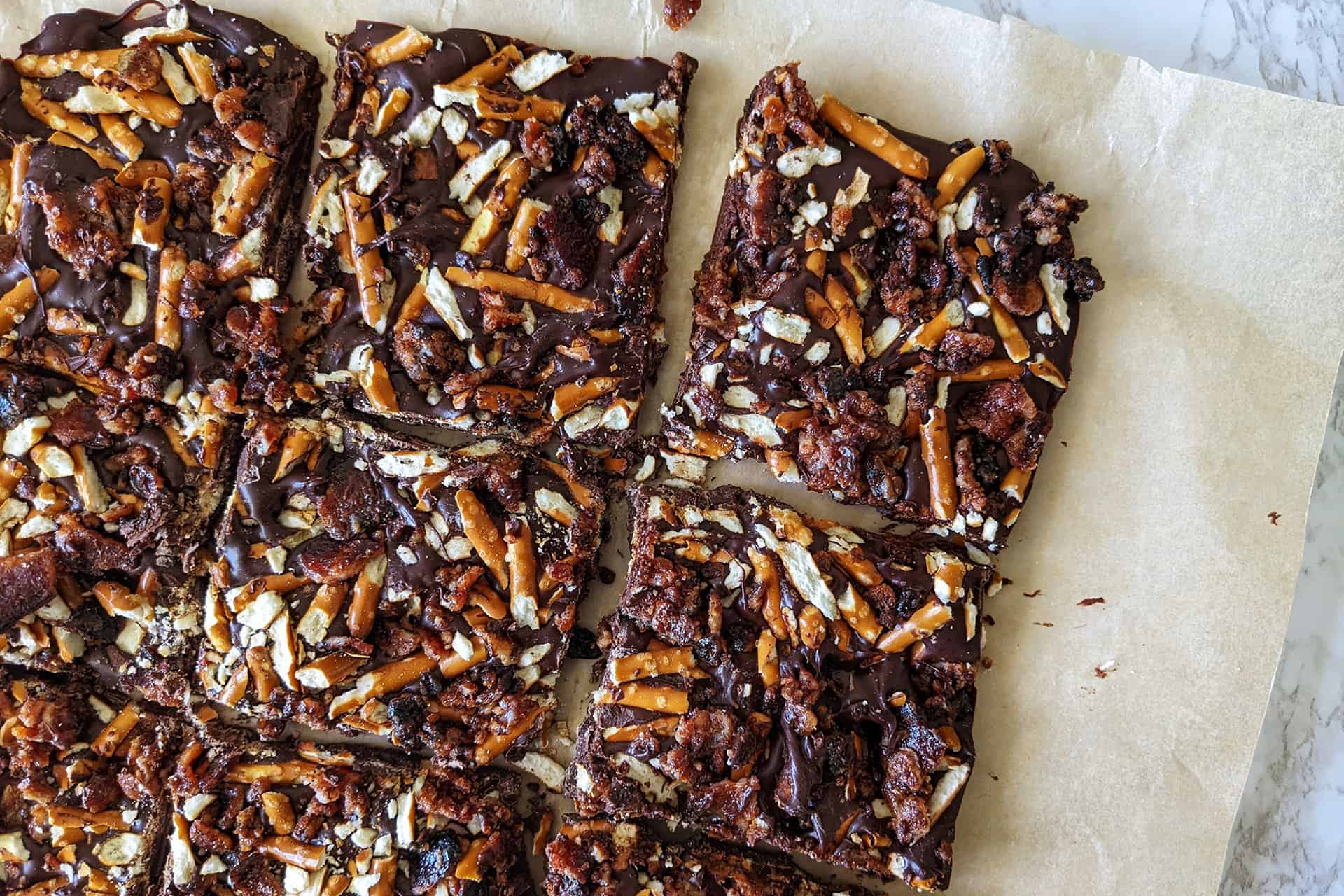 Chocolate bark with candied bacon and pretzel pieces