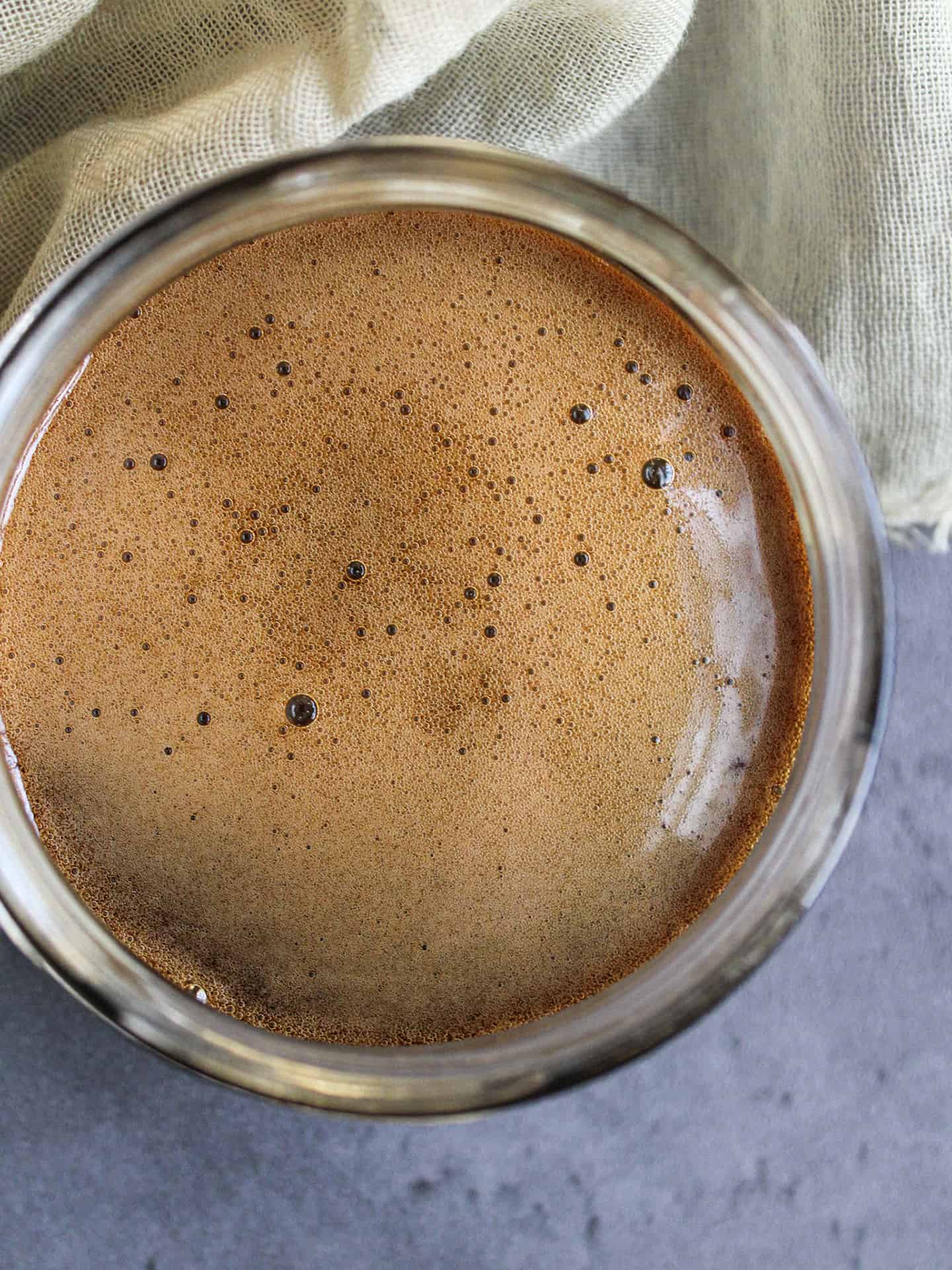 A top down view of a bowl of Guinness reduction glaze