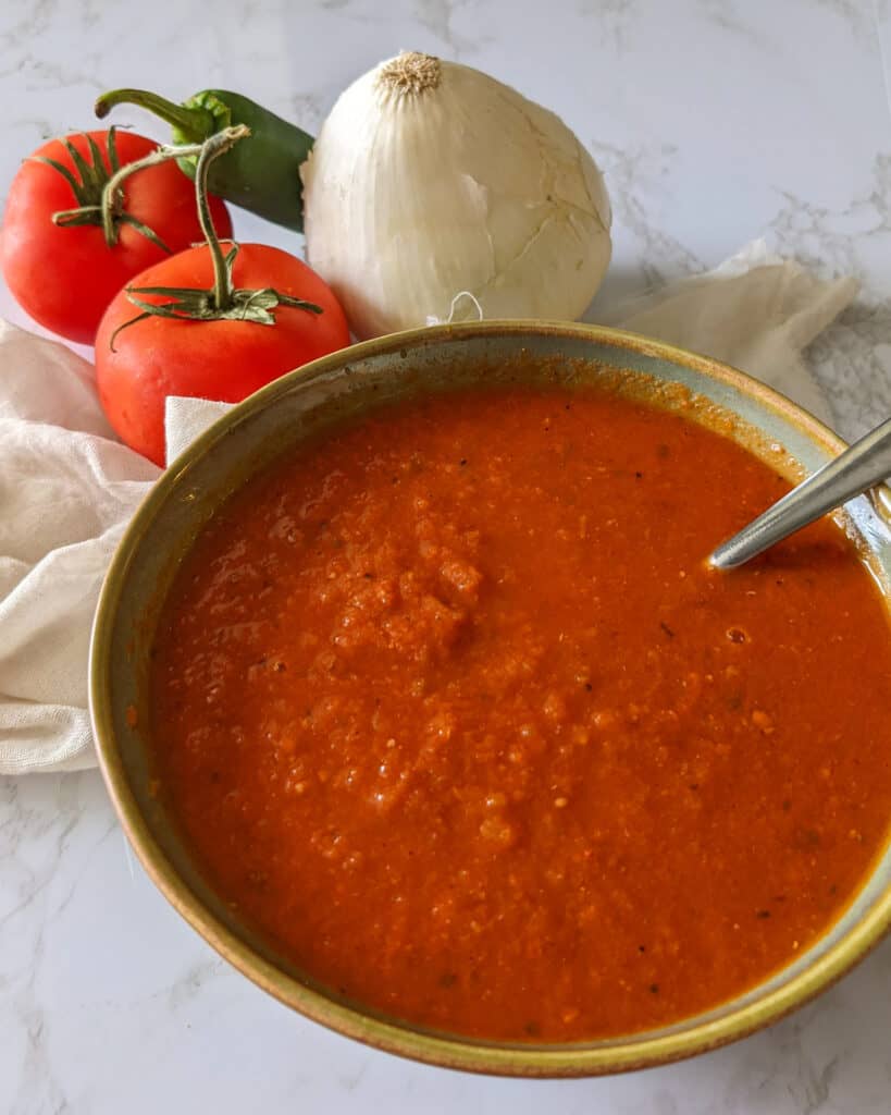 A bowl of spicy homemade ranchero sauce