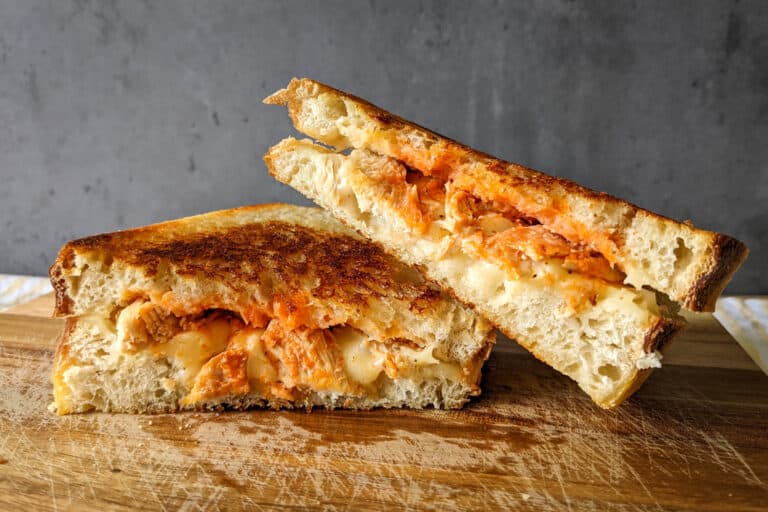 A sourdough buffalo chicken grilled cheese sandwich