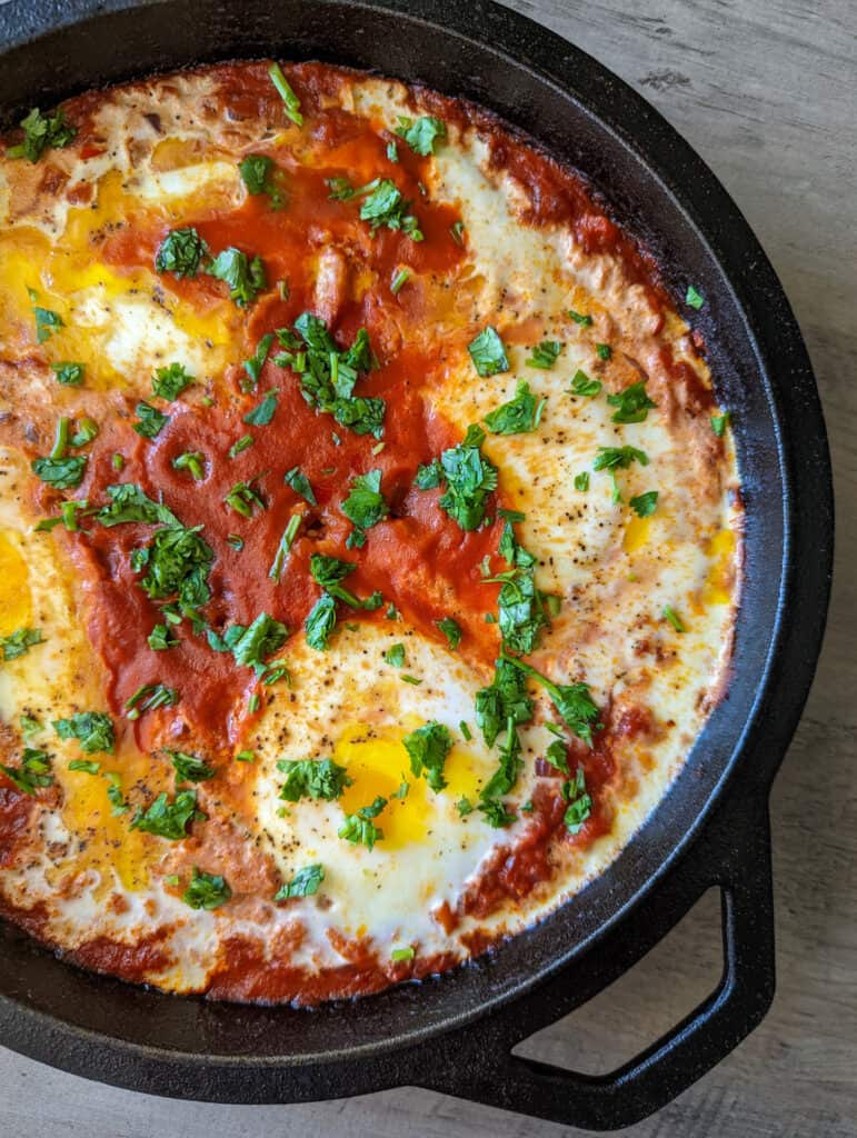 Spicy small batch shakshuka in a cast iron skillet