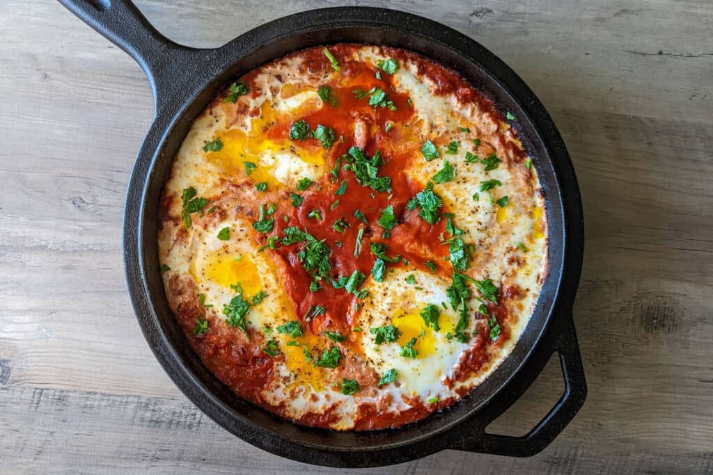 A cast iron skillet of spicy shakshuka for two
