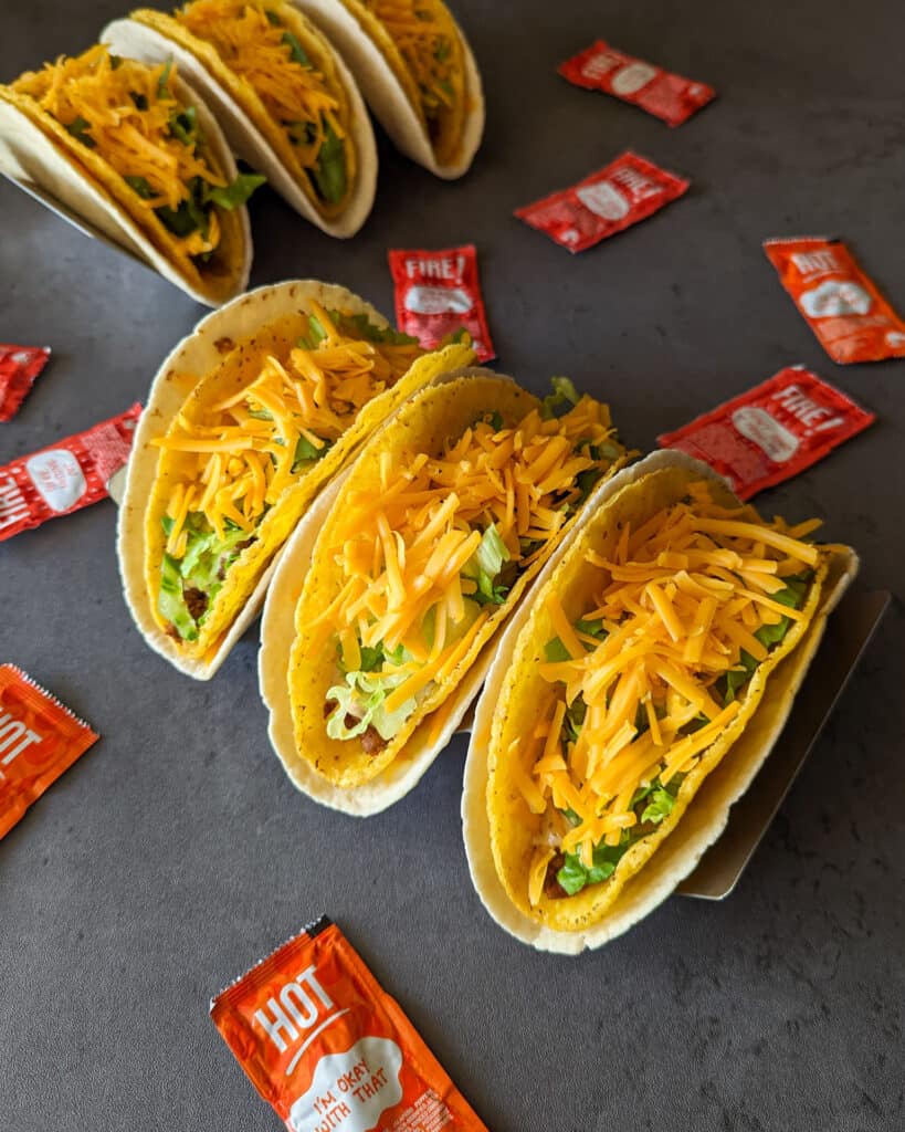 Taco bell cheesy gordita crunch recipe tacos with a bunch of hot sauce