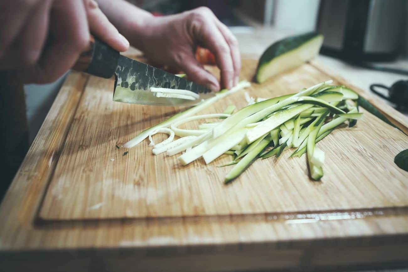 Chopping veggies. Original public domain image