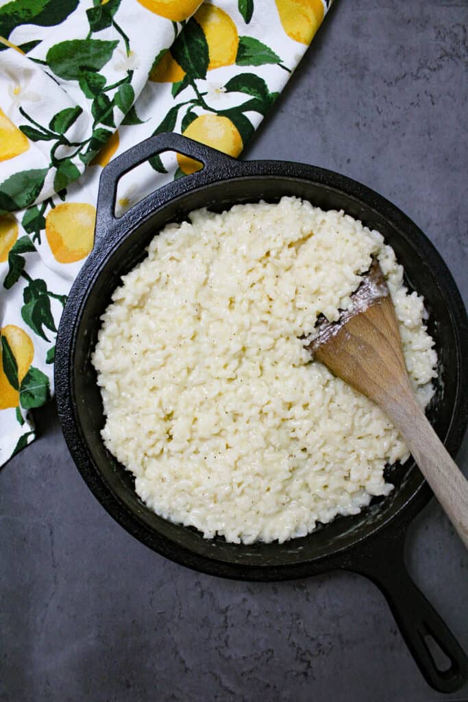 An easy parmesan risotto made in a cast iron pan