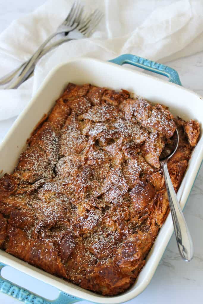 A casserole dish of easy kid friendly croissant french toast bake