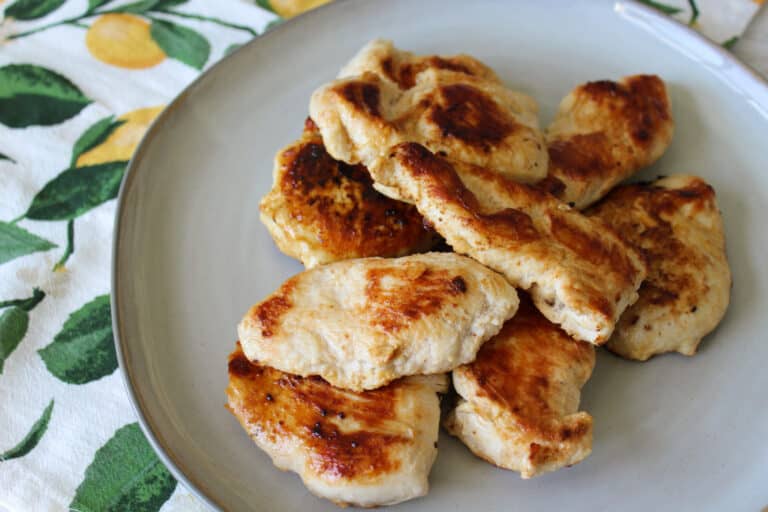Zesty lemon marinated grilled chicken on a plate