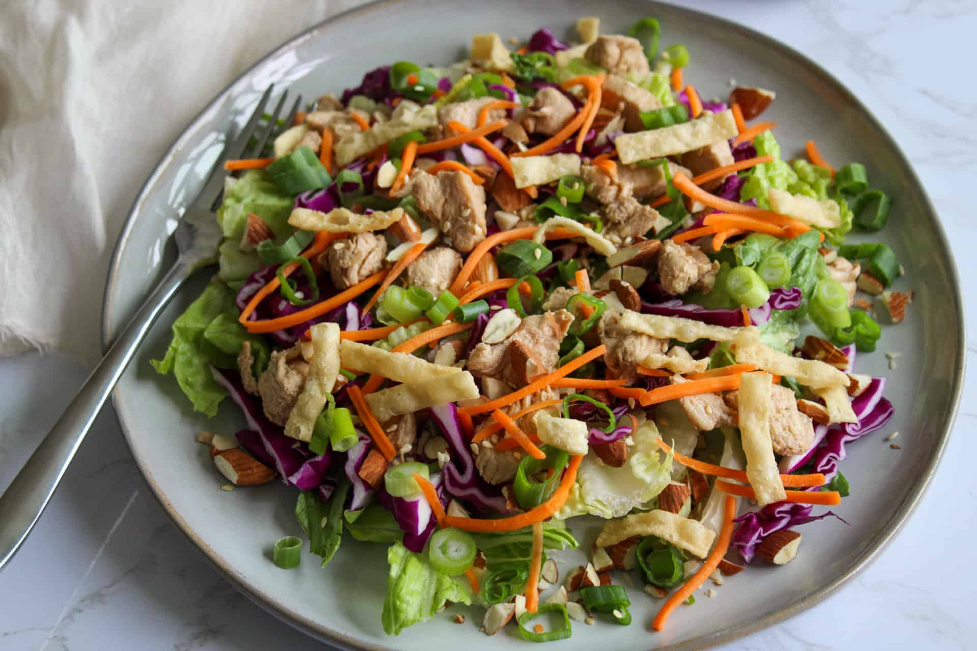 A Panera inspired Asian chicken salad on a plate