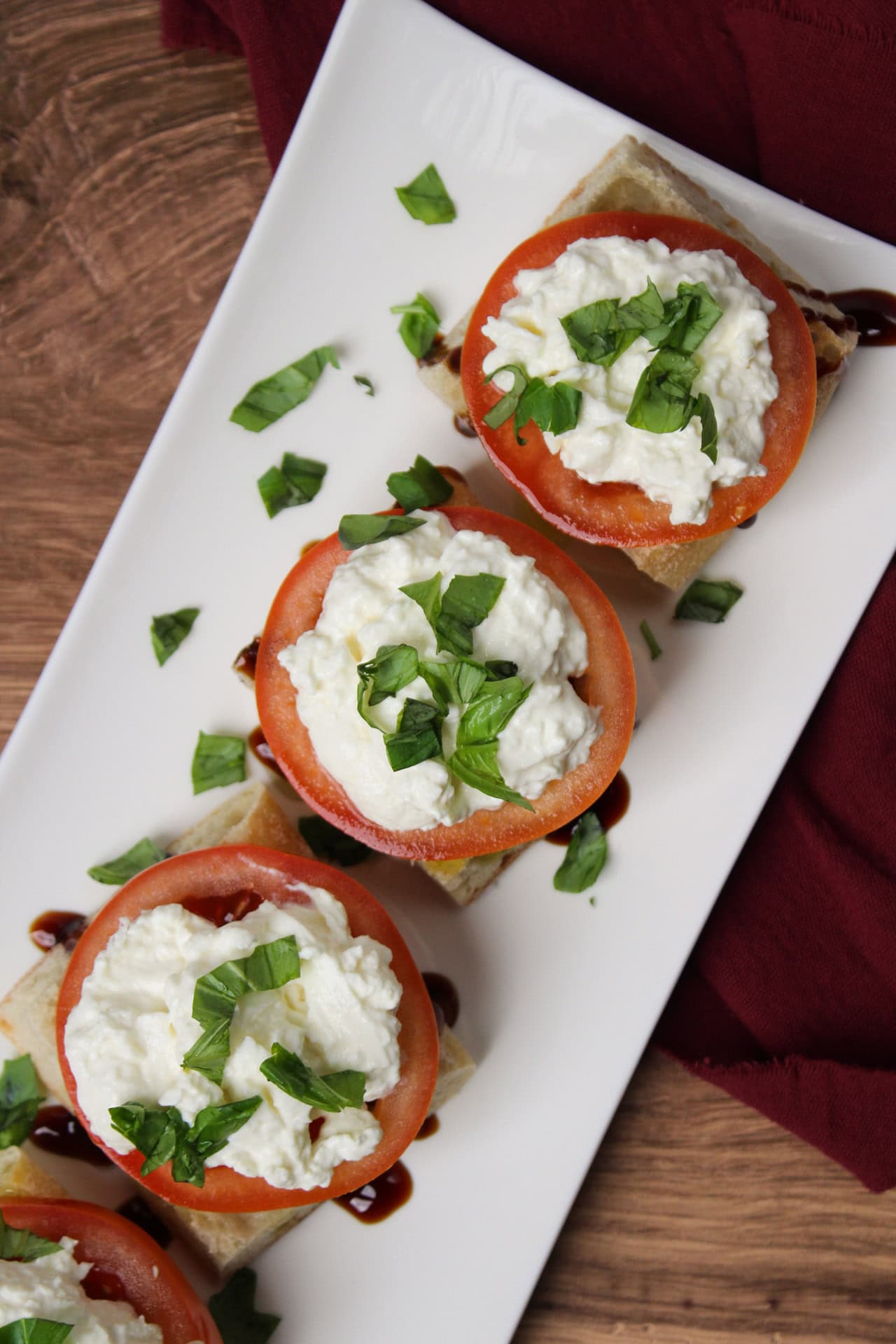 Burrata toast on a serving dish.