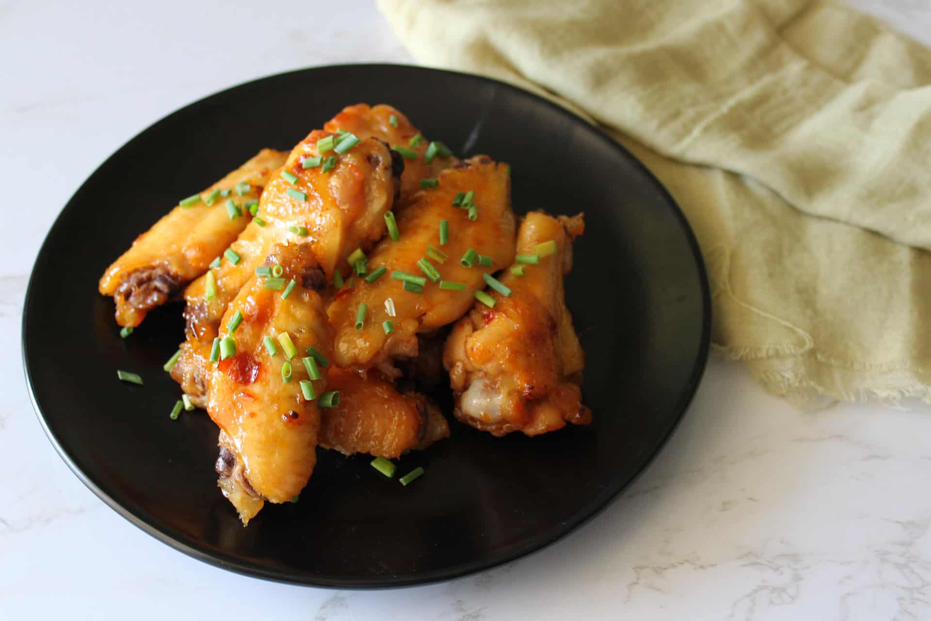 A plate of agave chili lime chicken wings for game day
