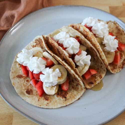 A plate of French toast cinnamon breakfast tacos.
