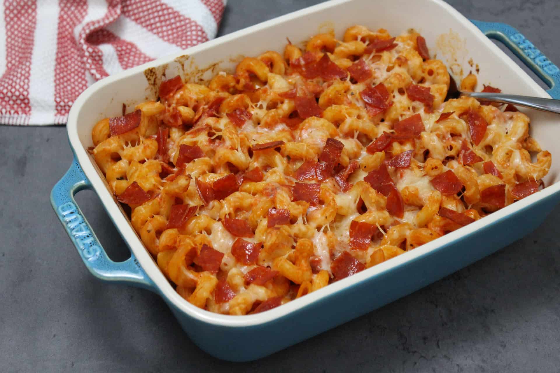 A baking dish of pepperoni pizza pasta.