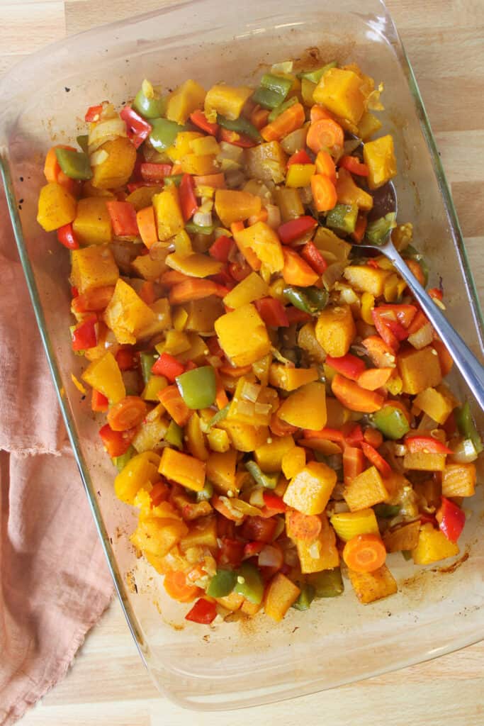 A baking dish filled with a fall vegetable medley.