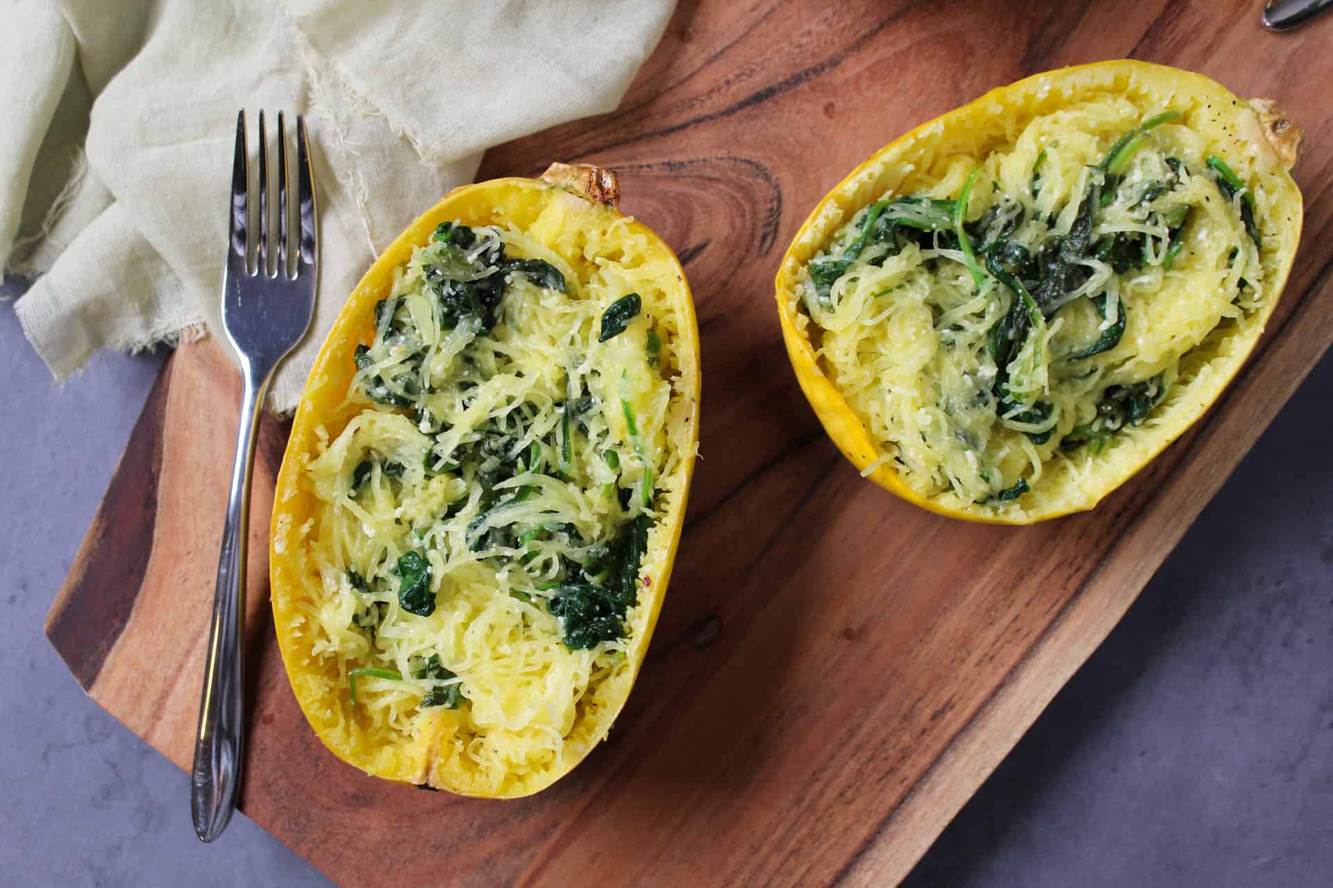 Two halves of a spaghetti squash.