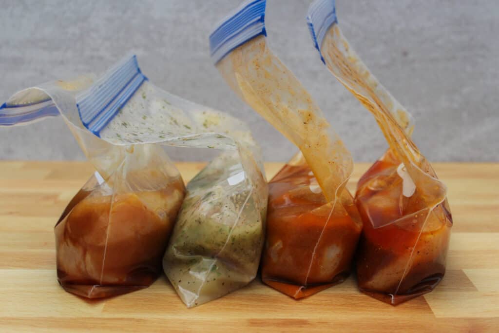 Freezer chicken marinades prepped in bags.