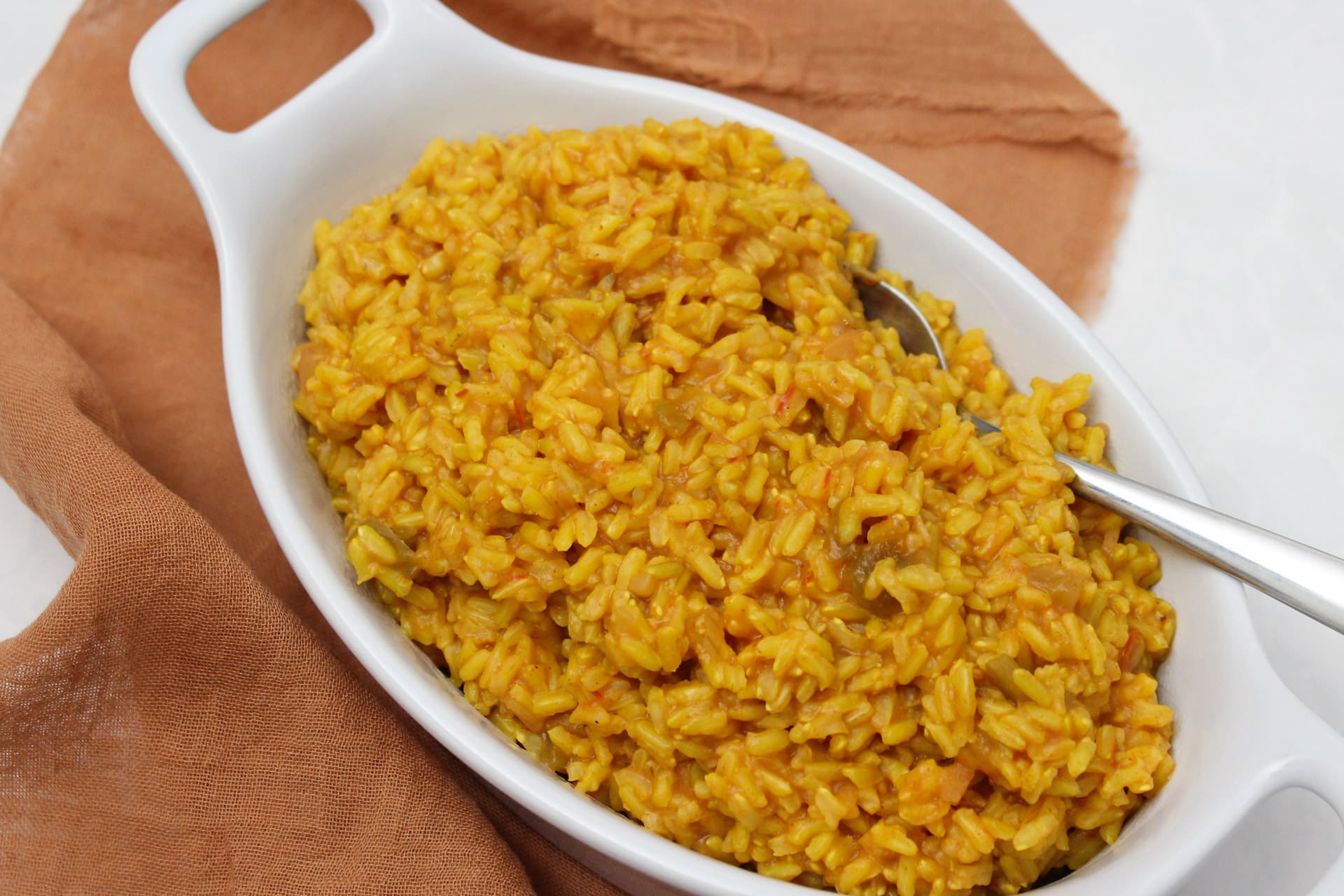 A serving dish of Mexican rice.