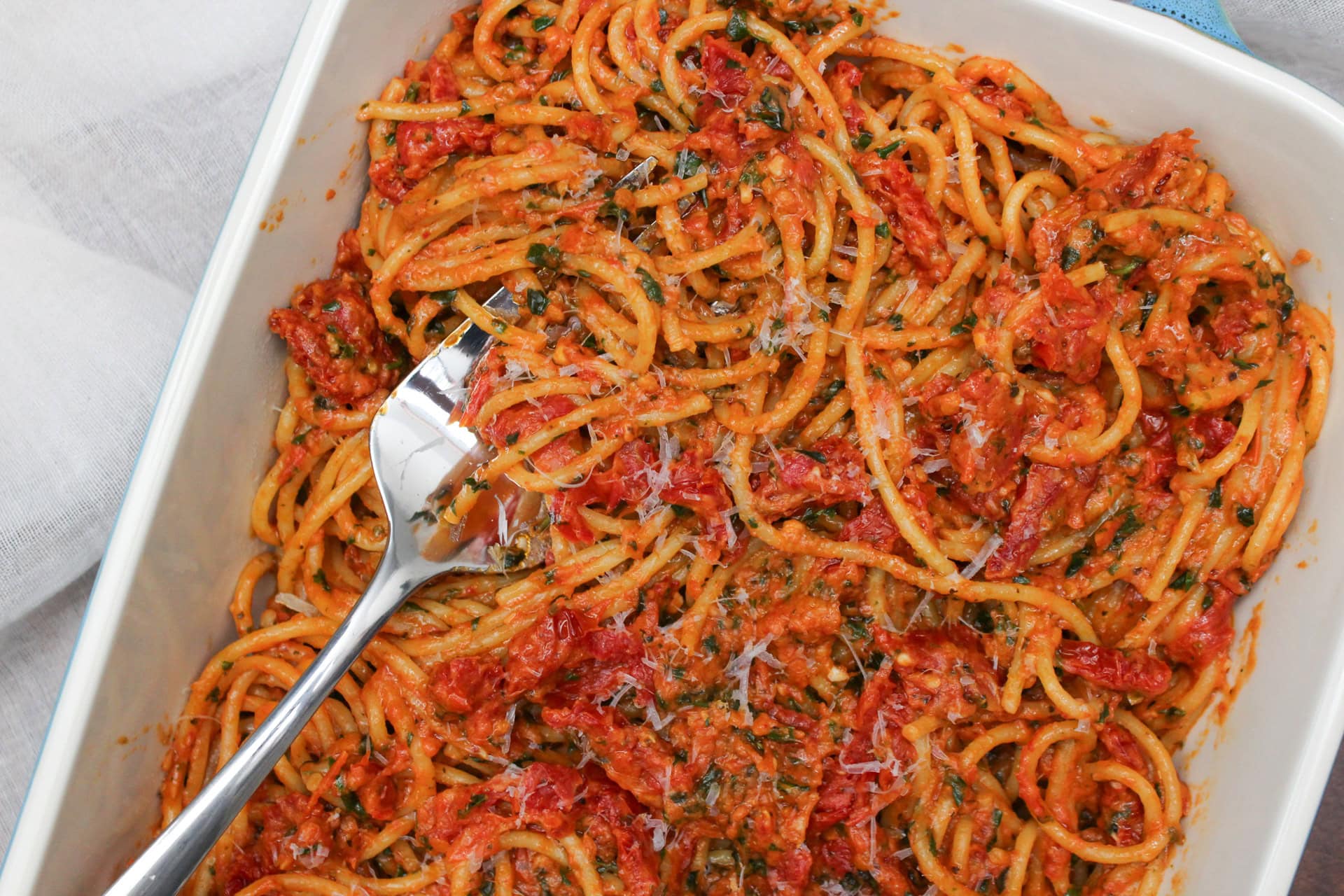 Spaghetti bake in a serving dish.