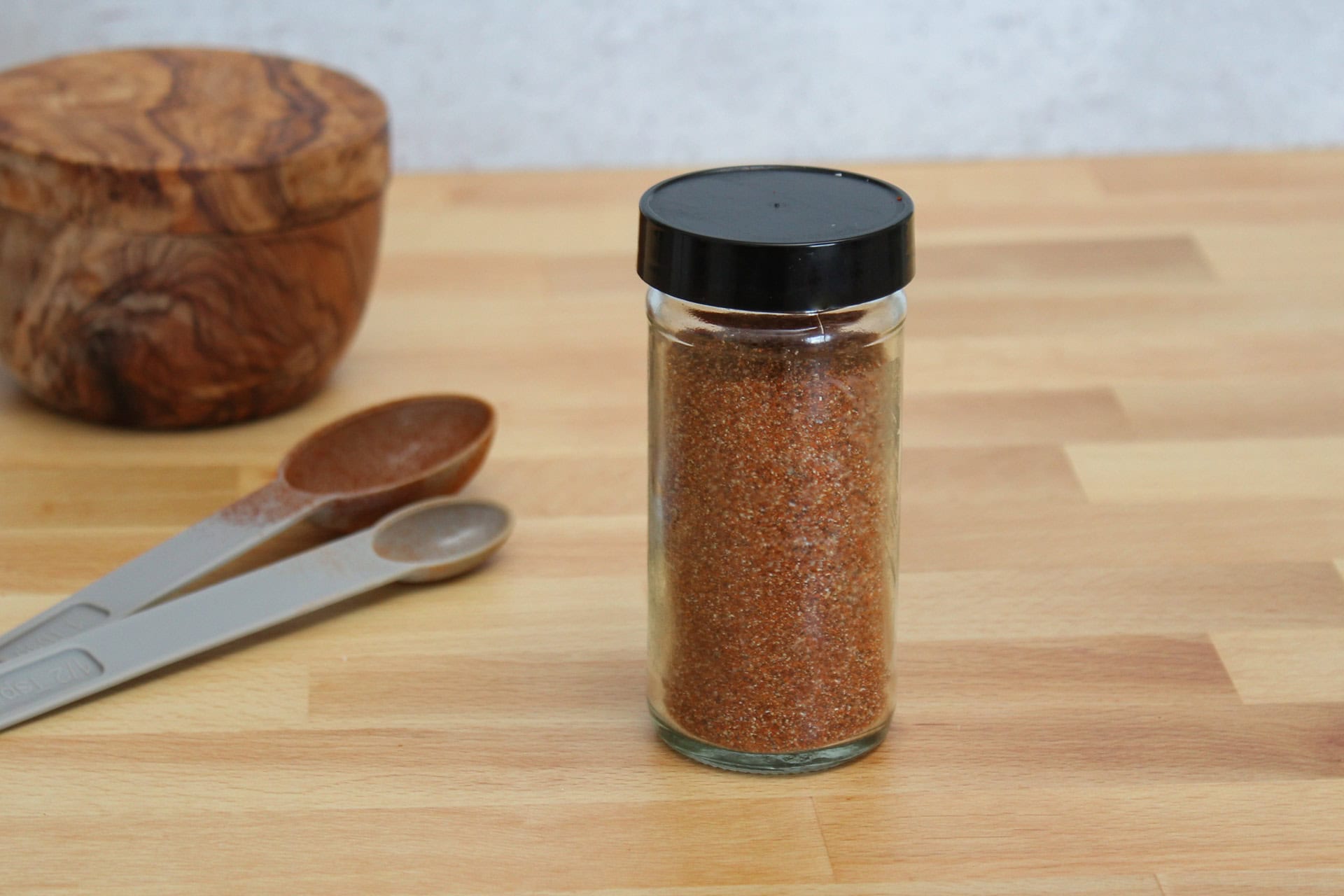 A jar of homemade taco seasoning.