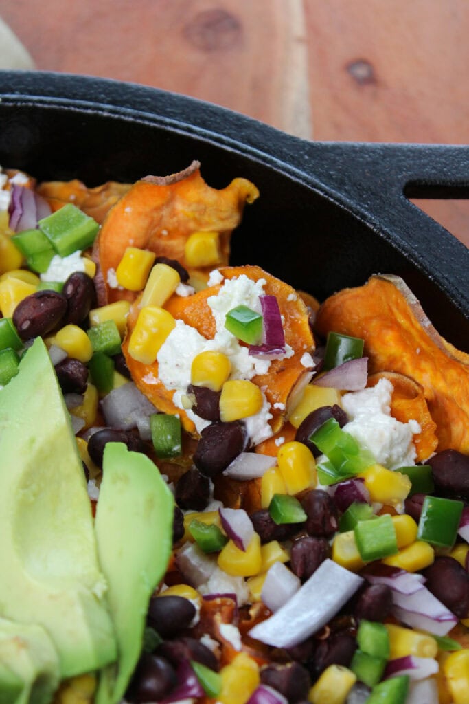 Sweet potato nachos with goat cheese and black beans.