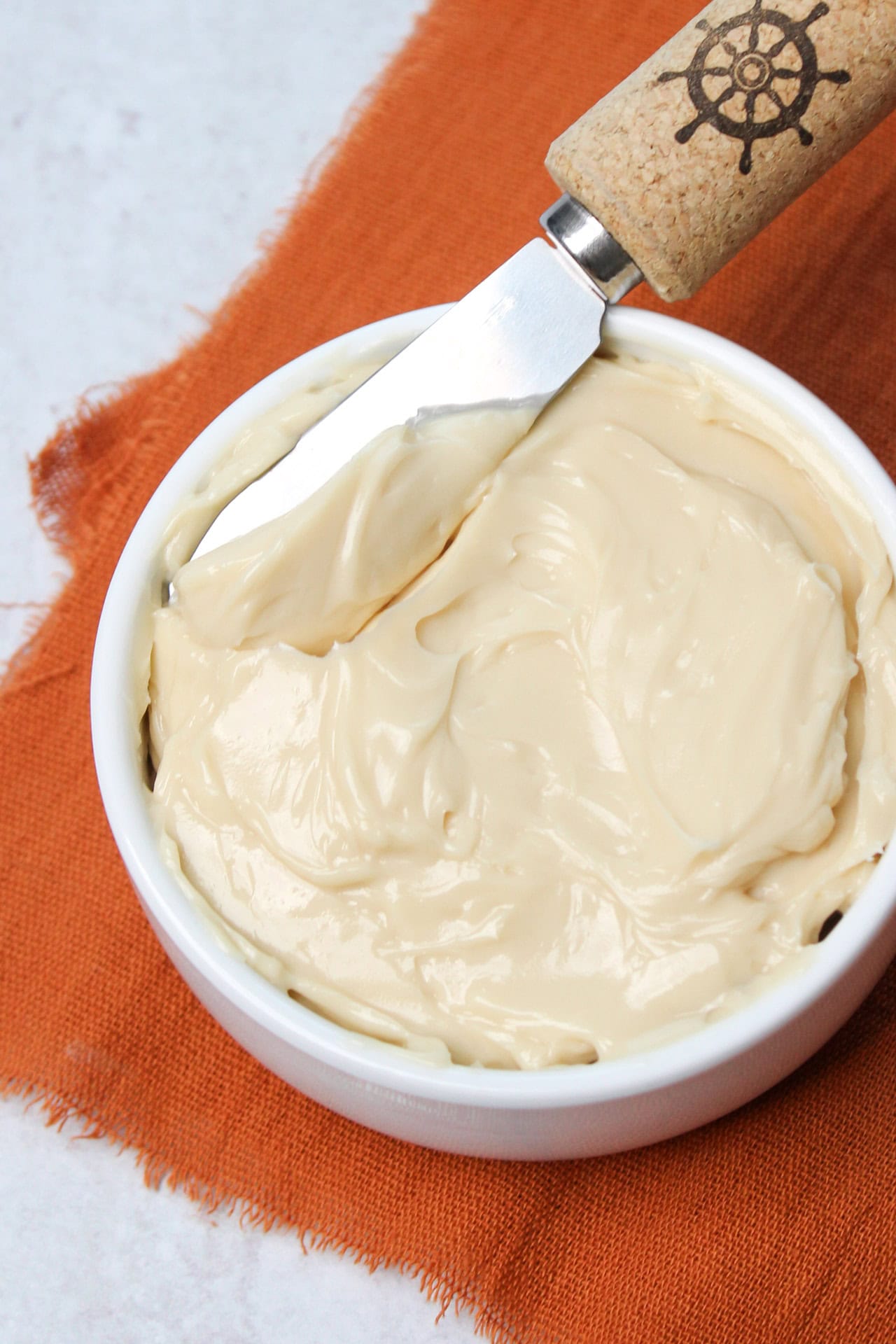 Maple butter with a spreader knife.