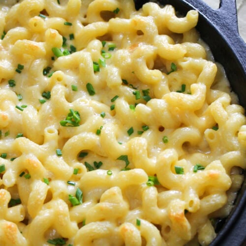Mac and cheese in a cast iron skillet.