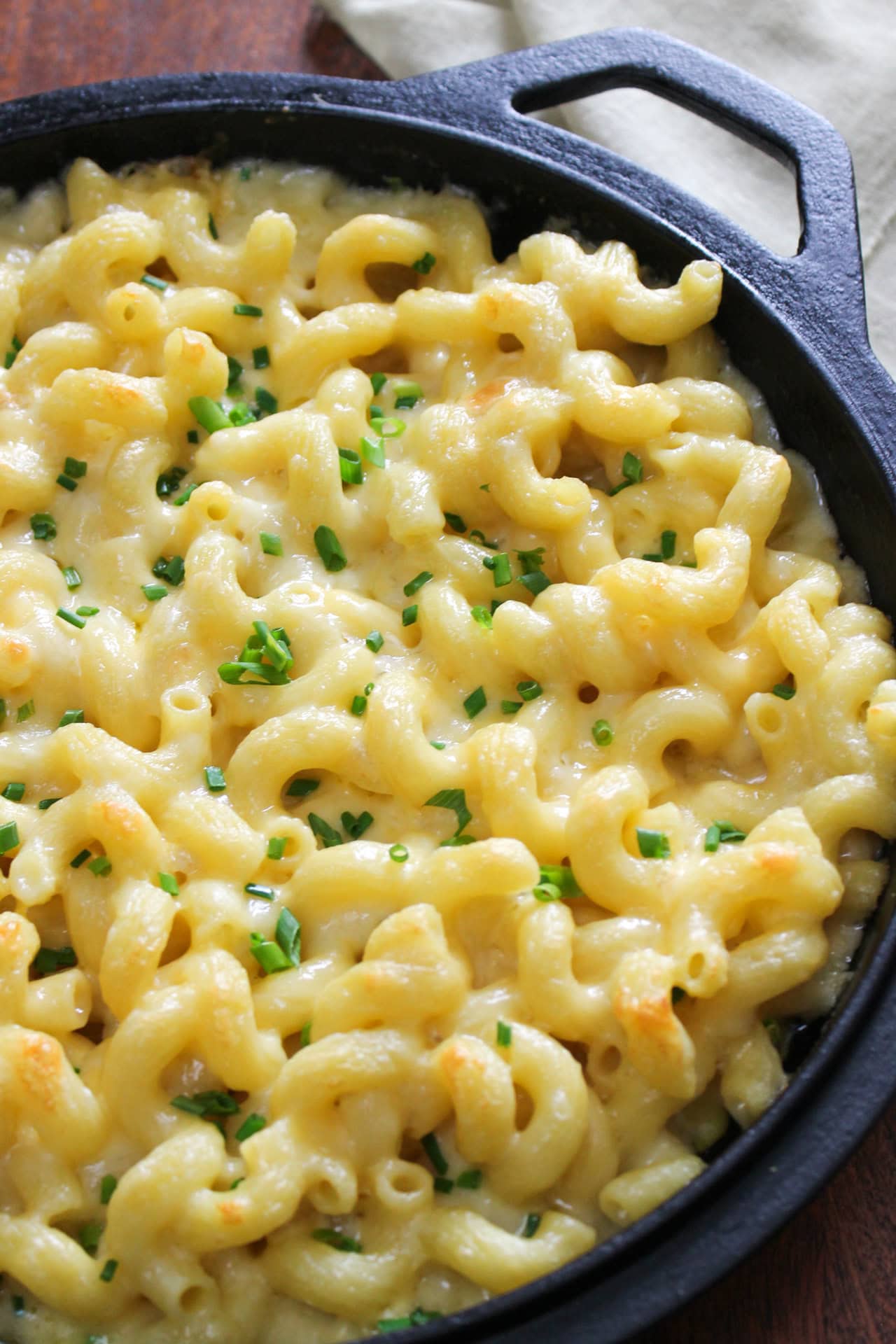 Mac and cheese in a cast iron skillet.