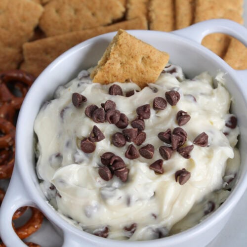 Cheesecake dip with chocolate chips and graham crackers.