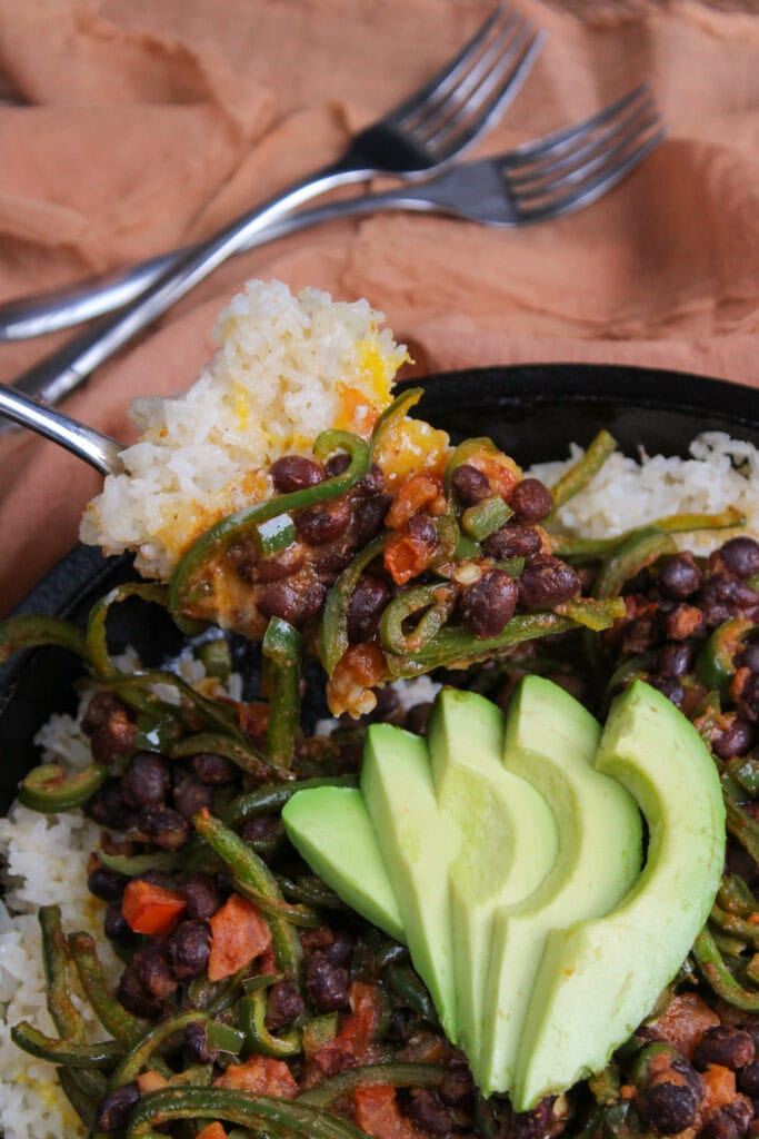 A forkful of black bean and rice bake