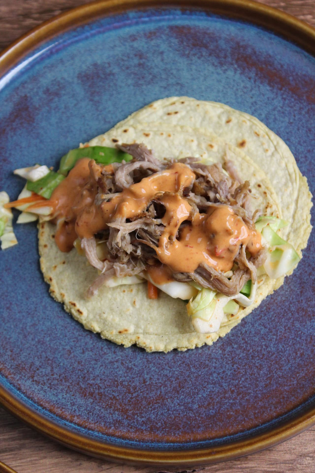 Pulled pork tacos with Hawaiian BBQ aioli.