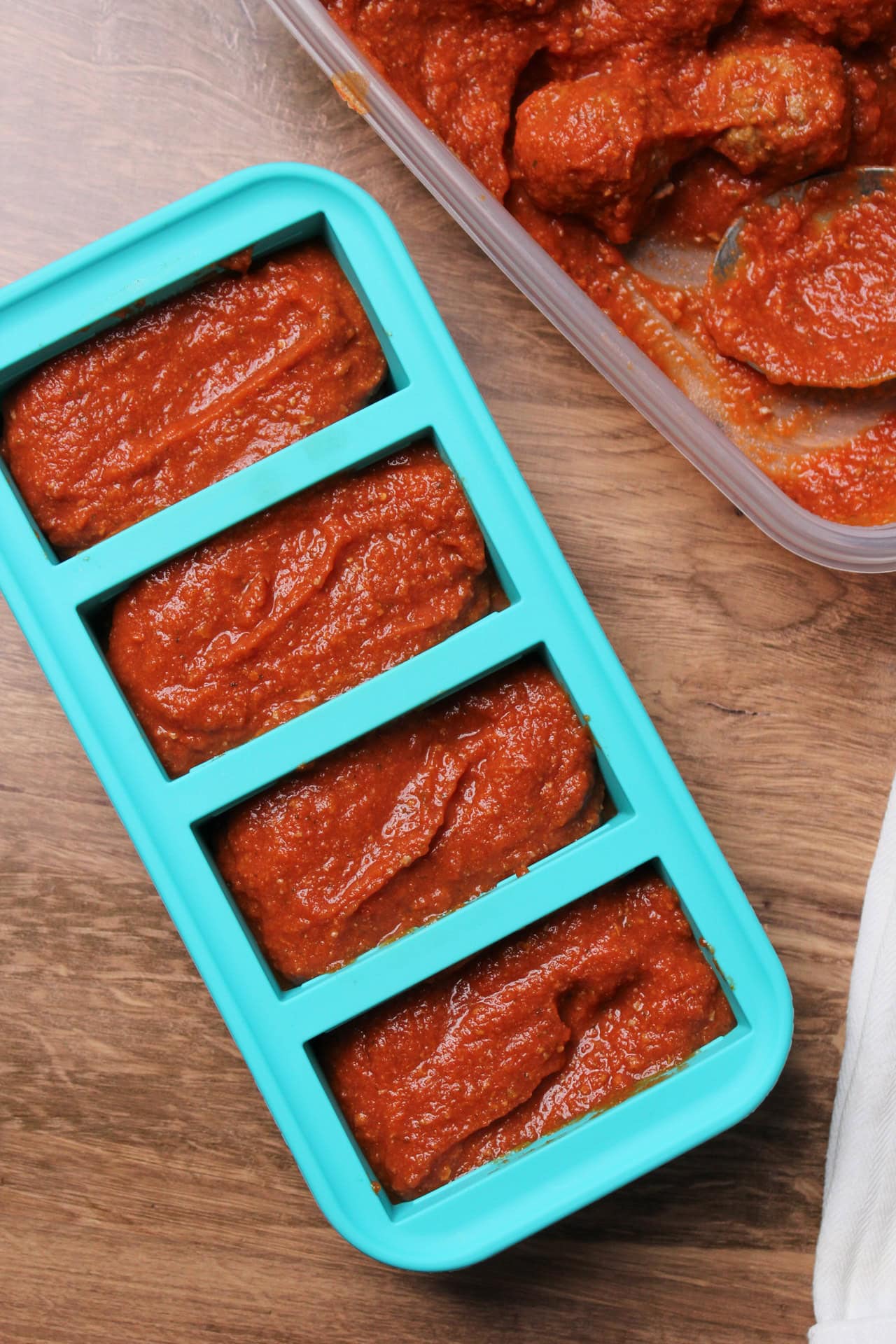 Souper Cubes freezer molds with meatballs and sauce.