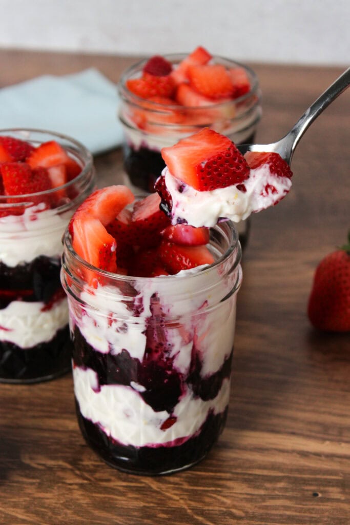 Greek yogurt dessert parfait with fresh strawberries.