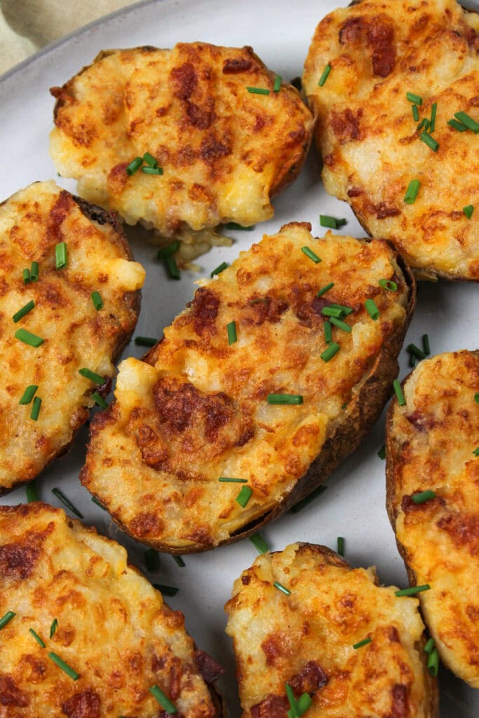 Crispy air fryer twice baked potatoes with bacon and cheese.