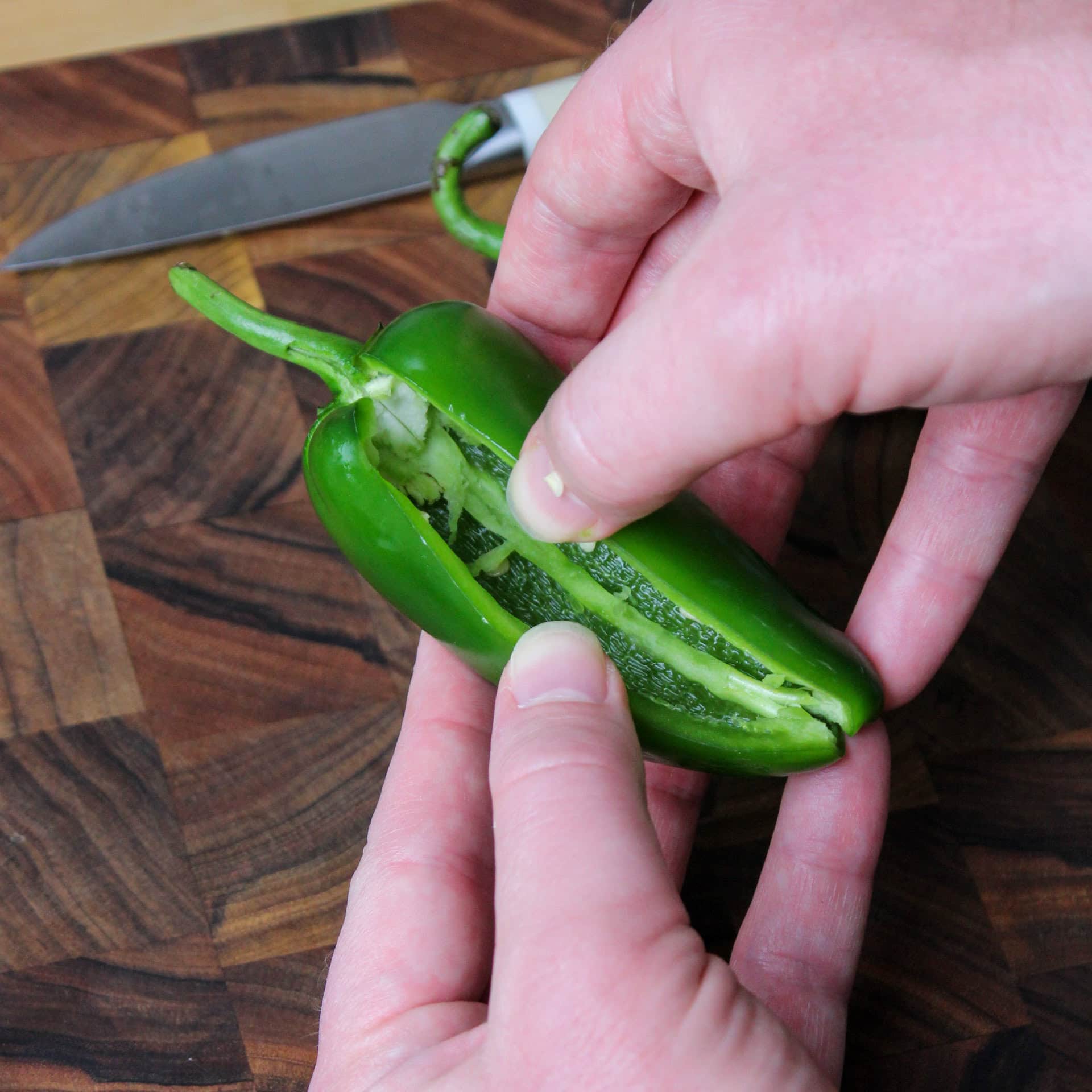 A jalapeno after it's been prepped for jalapeno poppers.