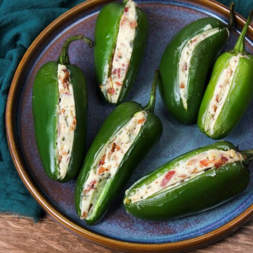 A plate of cream cheese jalapeno poppers.