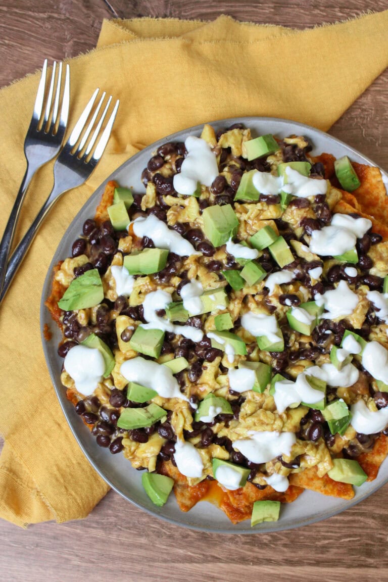 A plate of chilaquiles rojos for two.