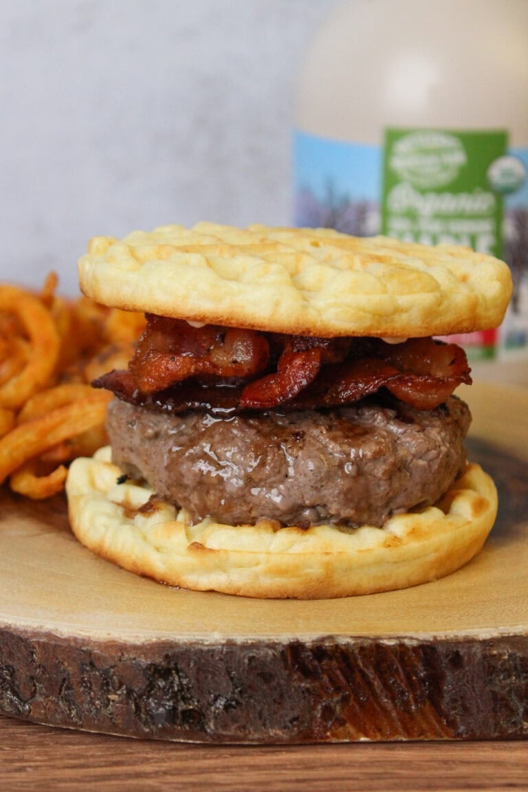 A maple bacon bourbon burger served on a waffle bun.