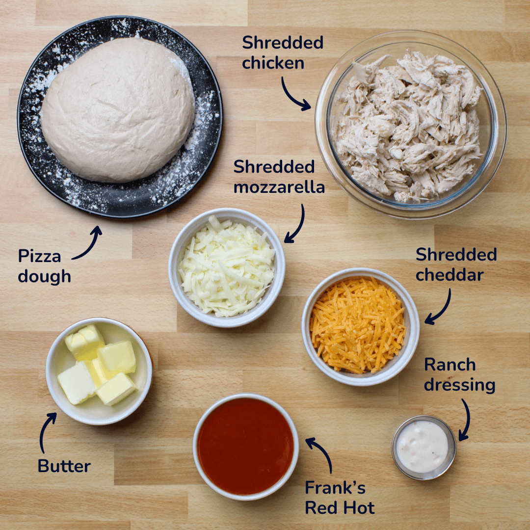Ingredients for making a buffalo chicken calzone: pizza dough, shredded chicken, shredded mozzarella, shredded cheddar, butter, Frank's Red hot, and ranch dressing.