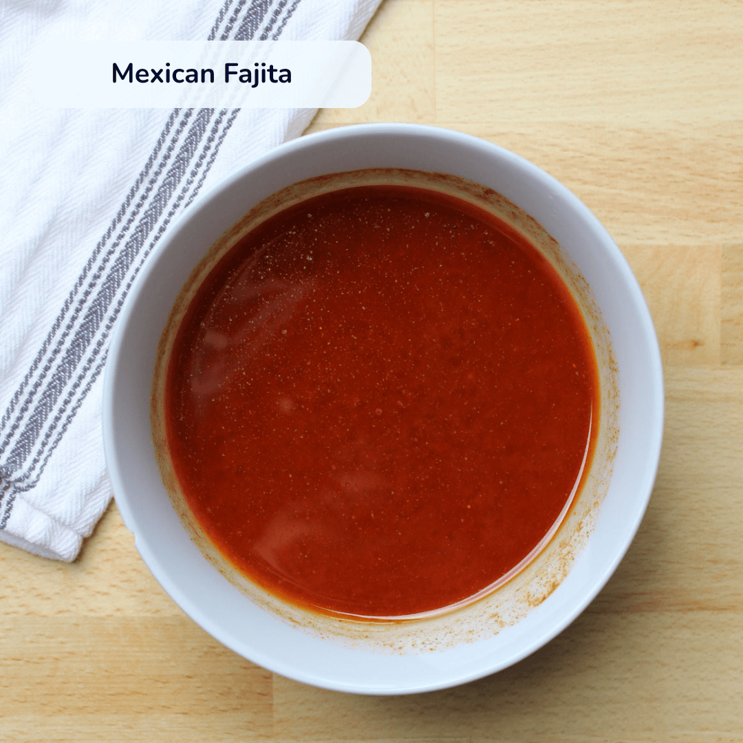 Mexican fajita chicken marinade in a bowl.