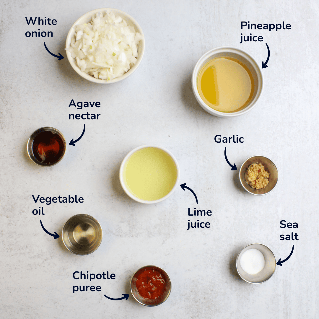 Ingredients for pineapple chipotle taco sauce: white onion, pineapple juice, agave nectar, lime juice, garlic, sea salt, chipotle puree, and vegetable oil.