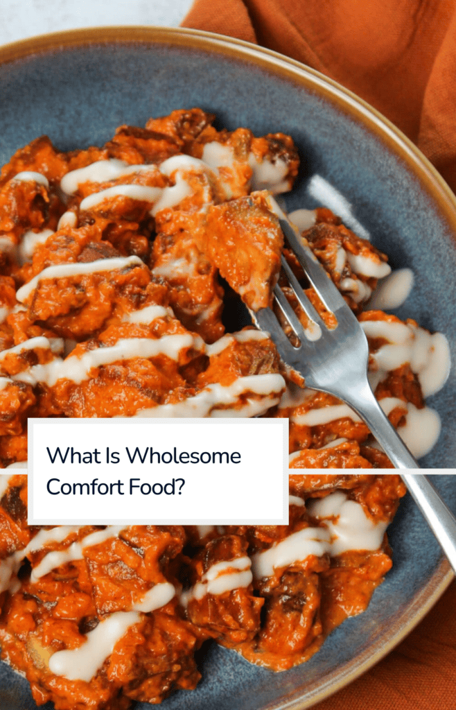 A bowl of freshly made patatas bravas with the title overlaid: what is wholesome comfort food?
