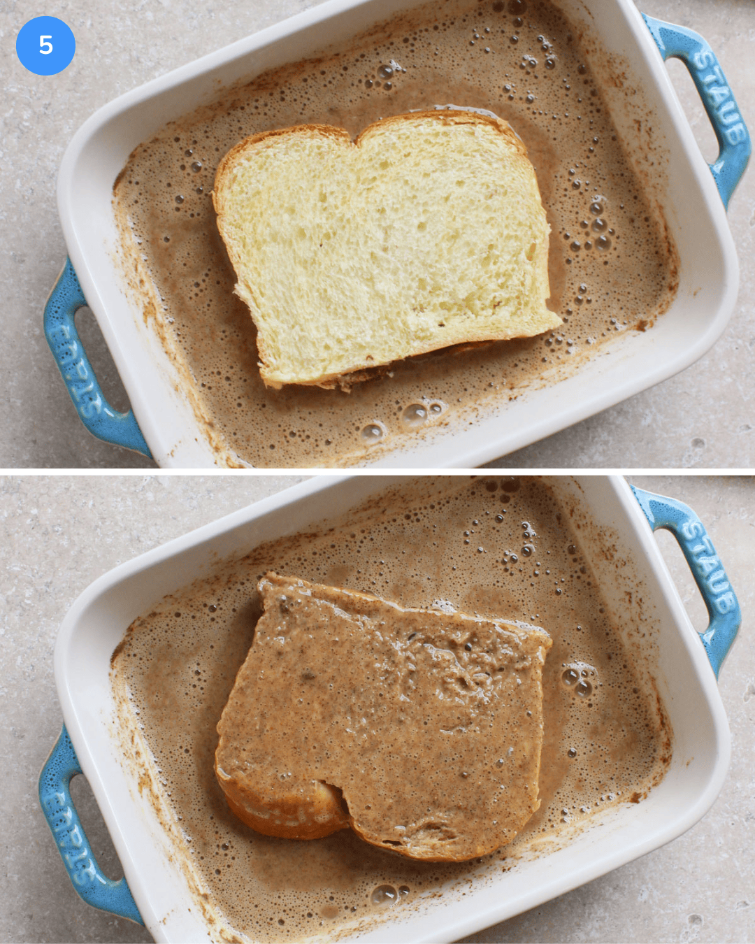 A slice of brioche bread soaking in a French toast custard mixture in a ceramic dish.