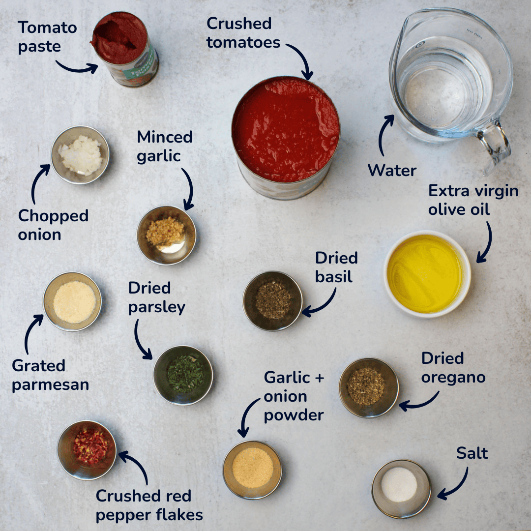 An ingredients shot of Italian pasta sauce: crushed tomatoes, tomato paste, water, onion, garlic, olive oil, parmesan, and seasonings.