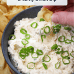 A blue stone bowl of freshly made creamy onion dip with a title overlaid.