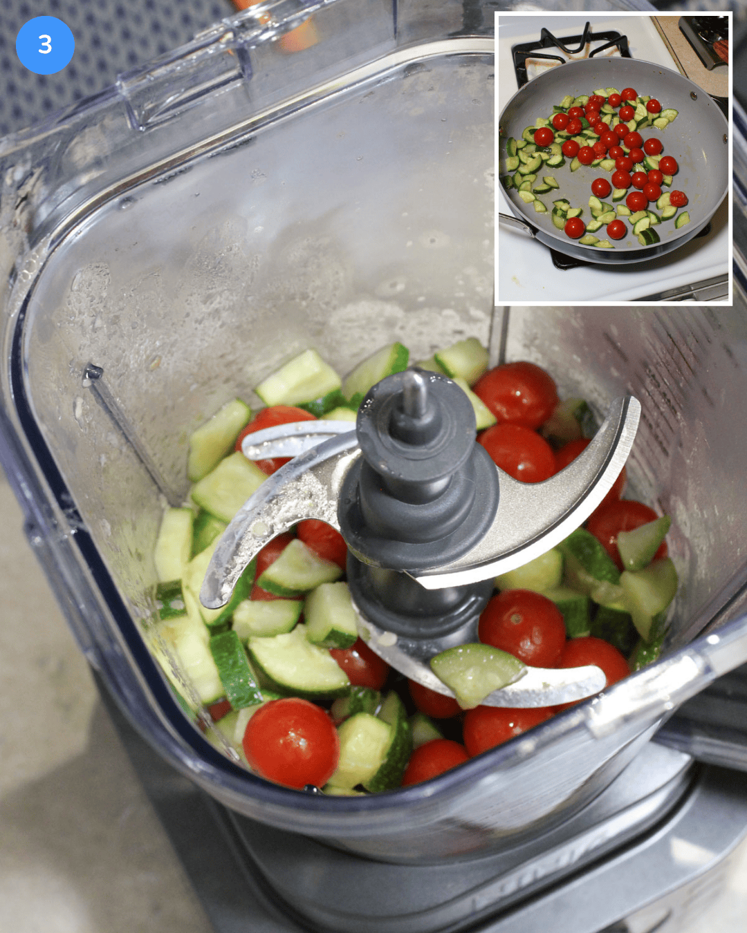 A blender filled with cooked zucchini and cherry tomatoes.