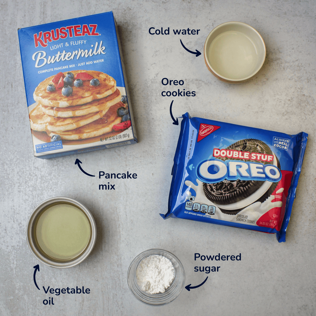 Ingredients for making fried oreos: oreo cookies, pancake mix, cold water, vegetable oil, and powdered sugar.