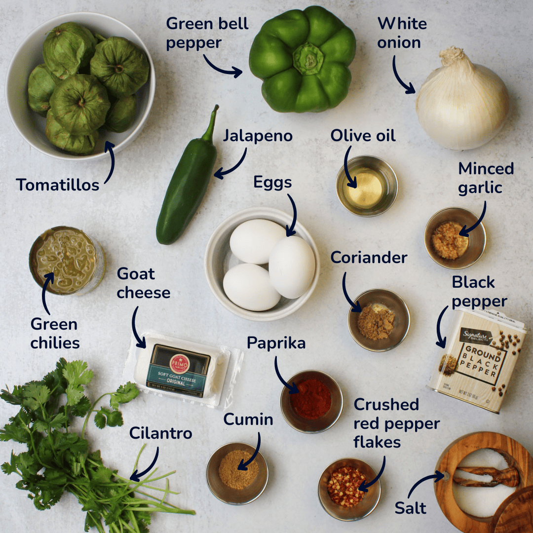 Ingredients for making green shakshuka: tomatillos, green bell pepper, white onion, jalapeno, green chilies, olive oil, minced garlic, coriander, paprika, cumin, crushed red pepper flakes, black pepper, salt, eggs, goat cheese, cilantro.